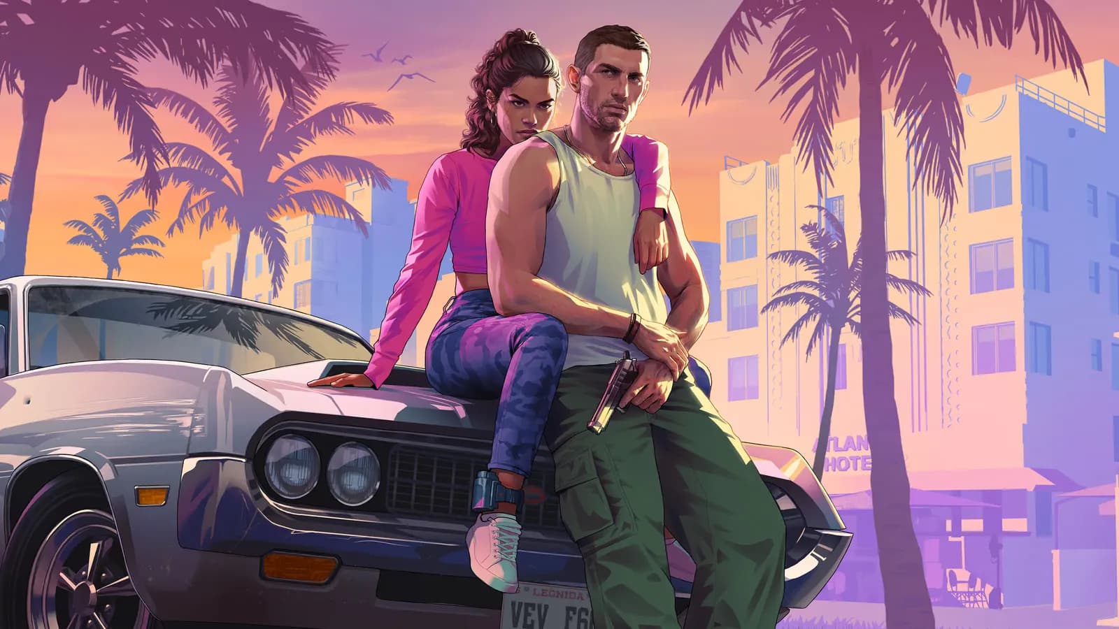 Jason and Lucia sitting on a car
